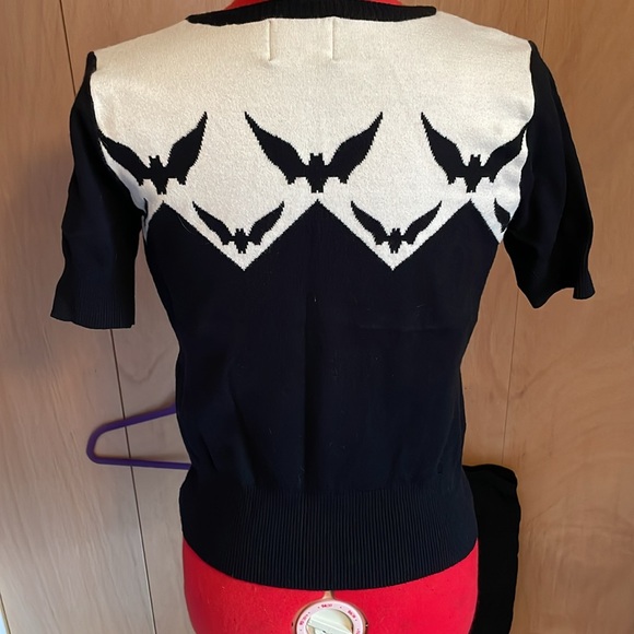 Hell Bunny white and black knit top with bat details and black bow. - Picture 4 of 6